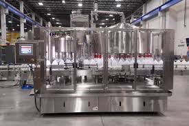 A modern water treatment facility with stainless steel tanks and pipes