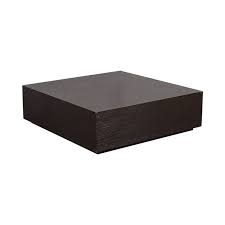 A coffee table is an essential touch for any living space, and if you're being boxed out by tiers of square furniture, a circular table like this one might be just the thing to break up the expectations of your space while still delivering surprising surface area. 90 Off Espresso Wood Coffee Table Tables