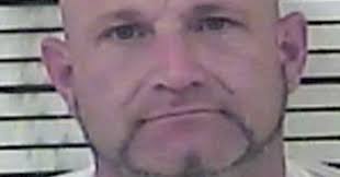 Man charged with attacking two at car wash