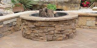 The wall and columns were built using borgert. Patio Retaining Wall Outdoor Fire Pit The Order Of Things Heritage Block Retaining Wall Block