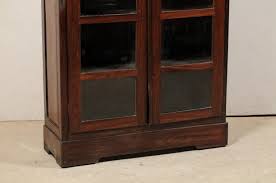 With this cabinet in your home, the cheerfulness is added to its surroundings. Antique British Colonial Rosewood Cabinet With Glass Panel Doors For Sale At 1stdibs