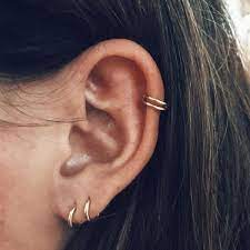 Double Helix Piercing The Complete Experience Guide With Meaning Ear Piercings Ear Earrings Double Helix Piercing