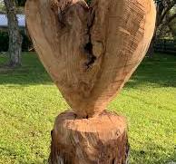 Heart-shaped wood carving from storm-damaged tree