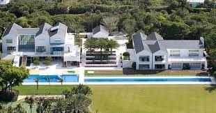 Tiger Woos S 60 Million Florida Home Has A Running Track And 4 Hole Golf Course In His Back Yard Along With A Full Mansions Celebrity Houses Florida Mansion
