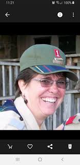 Vendor of hat with unique design under brim?