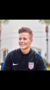 The hairstyle features cascading long hair done exactly the right way. Dyke Hair