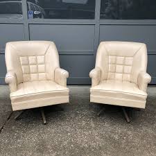 Mid century modern swivel rocker. Pair Mid Century Ivory Vinyl Swivel Rocker Chairs Swivel Rocker Chair Rocker Chairs Chair