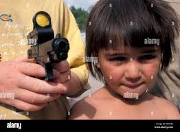 Child kosovo hi-res stock photography and images