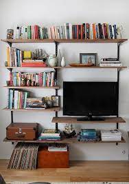 Here S A Quick Update To Bland White Track Shelving Paint Brackets And Uprights Black Or Buy Them That Way Diy Space Saving Small Spaces Small Space Living