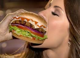 Carl's Jr is mocked online after Todd Gurley takes a bite from a fake  burger