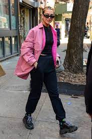 In kuala lumpur, malaysia, she explored caves and touched murals while wearing this adorable acne studios shirt and daisy satin tulle slip combo. Dua Lipa Street Style New York 01 12 2020 Celebrity Street Style Street Style Fashion Outfits