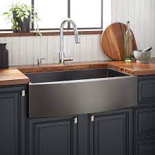 A coordinating drain assembly with strainer basket and a stainless steel grid completes the package. 36 Atlas Stainless Steel Farmhouse Sink Curved Apron Gunmetal Black
