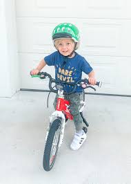 Taking the pedals off a bike and lowering the seat, to have it act as a balance bike. Best Way To Teach A Child To Ride A Bike Oh Happy Play