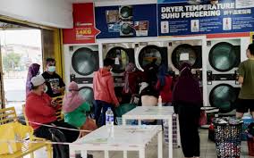Mesin basuh layan diri dengan memasukkan duit syiling. Boleh Buka Kedai Dobi Layan Diri Kata Ismail Free Malaysia Today Fmt