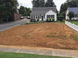 The first rule of grading is that the ground should always slope away from your house. Turf Renovations Llc