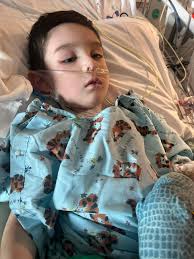 This is a picture of my youngest son ( 1 at the time ) shortly after being  diagnosed with terminal brain cancer. The lanyard he is wearing was my  fathers who passed