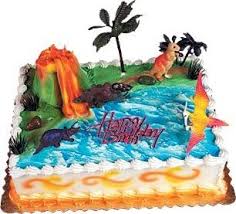 So können sie einen dino kuchen selbst zubereiten mit diesem einfachen kuchen rezept. Amazon De Oasis Supply Dinosaurier Kuchen Rex Topper Kit 1 Set