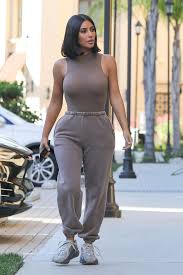 People are comparing kim kardashian west's yeezy foam runners to everything from crocs to a pasta strainer, and even a bicycle helmet. Kim Kardashian Wearing Kanye West S Yeezy Line Photos Hollywood Life Kim Kardashian Outfits Kardashian Style Kardashian Outfit