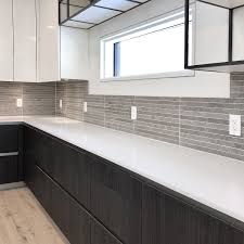 light gray subway backsplash tile