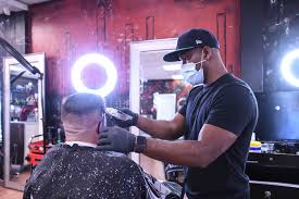 Barber shop reopens under relaxed COVID-19 restrictions in Hattiesburg