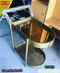 for sale steel trolly 2 sheleve glass with wheels new made in china price 17 bd للبيع ترولي حديد للضيافة من طابقين زجاج جديد صنع في الصين الس
