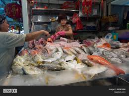 Creating the new age fishmonger stall. Singapore September Image Photo Free Trial Bigstock