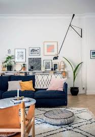 Minimalist Living Room Design With Dark Blue Sofa Jpg 1180 608 Blue Sofas Living Room Blue Sofa Living Blue Couch Living