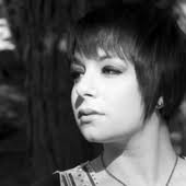 Thea Garrett music, videos, stats, and photos