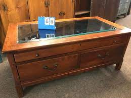 The glass insert on top looks into the top shallow felt lined drawer, a great place to display special items or coffee table books. Bob Timberlake Coffee Table W Removable Glass Top Auction Auctioneer Pro