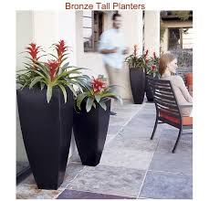 25 Diy Outdoor Decorating Ideas And Activities Tall Planters Outdoor Planters Planters