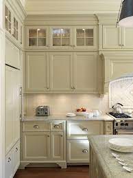 When it comes to maintenance, there are a few things to keep in mind. Tall Glass Kitchen Cabinets Novocom Top