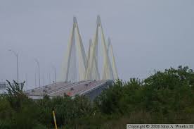 The suspension cables are 3224 feet long and the total length of the bridge is 6855 feet. Tx 146 Fred Hartman Bridge Baytown Texas