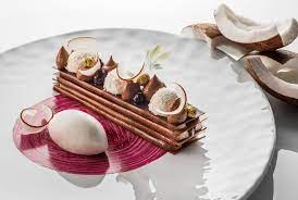 Puff pastry with frosting and almonds, an easy recipe. Le Chocolat Illanka Par La Chef Patissiere Eve Moncorger Chateau Saint Martin Spa Cree Des Dess Fine Dining Desserts Gastronomic Food Dessert Restaurants