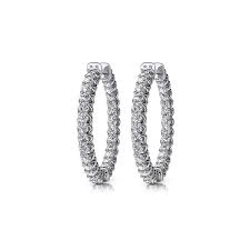 These beautifully crafted large 14k white gold circle hoop earrings come with white round cut diamonds set in a prong setting. Diamond U Prong Hoop Earrings In White Gold 1 Ctw