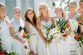 Bride and attendant bouquets, essential bridal party flowers, corsages and boutonnieres, ceremony décor, candelabra flowers, garlands of flowers and foliage, as well as all your table centerpieces, flowers for the cake table, topiaries, and reception flowers, too. 18 Striking Tropical Wedding Bouquets