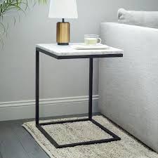 The marble isn't as white as it looks on the website and it has a lot more veining (which i like). Black And White Box Frame C Base Side Table