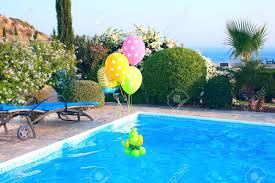 No one was going to be swimming in the pool, and she wanted to make sure the decor stayed in place. Colorful Balloons On Swimming Pool Stock Photo Picture And Royalty Free Image Image 5754595