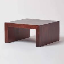 If you have a material of choice, look through a wide range of tables in different materials like marble, glass, wood, and metal. Homescapes Dakota Dark Wood Square Coffee Table 80 X 80 Cm Solid Mango Hardwood Furniture Baskets Not Included No Veneer Buy Online In Bahamas At Bahamas Desertcart Com Productid 57405372