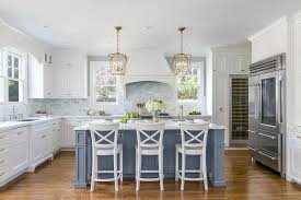 blue kitchen island with white wood x