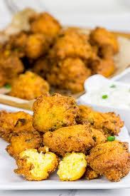 Combine cornmeal, seasoned salt, pepper, and garlic powder in a shallow dish. Often Served With Fried Fish Hushpuppies Are A Classic Southern Side Dish Fish Fry Side Dishes Southern Side Dishes Fish Fry Sides