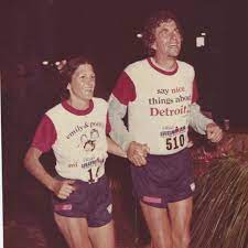 2.4 mile swim, 112 mile bike, 26.2 mile run. Emily T Gail Show Ironman Week John Judy Collins Co Founder Of Ironman Episode 15
