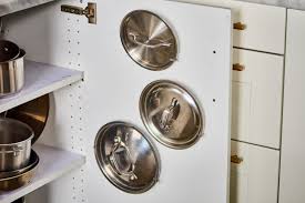 The 8 Trick To Miraculously Making Space For Your Pot Lids Where You Thought There Wasn T Any Pot Lids Cabinet Organization Kitchen Cabinet Organization
