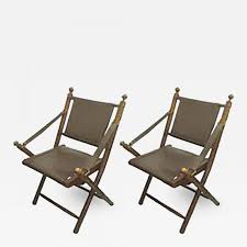 Rated 4 out of 5 stars. Pair Of Hand Stitched Leather And Faux Bamboo Campaign Folding Chairs