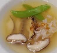 Abalone soup with wine and seafood flavors