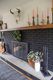 Installing heart pine floors and the final reveal. Our Black Painted Fireplace Bright Green Door