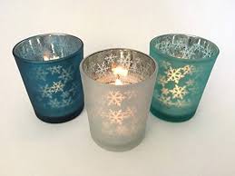 Read reviews for ashland® round glass votive candle holder. Set Of Blue And White Festive Xmas Glass Tea Light Votive Candle Holders Wedding Table Decorations Centrepiece Settings Vintage Tealight Holder Set Buy Online In Bermuda At Bermuda Desertcart Com Productid 59869131