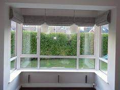 Decorating them can be a challenge due to the way the 3 window panes relate to one another, and the way they push out of the house's otherwise linear frame. 13 Window Dressing Ideas Patio