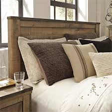 The trinell queen bedroom collection from ashley inspires rustic tones into your home. Ashley Furniture Trinell Queen Panel Headboard In Brown B446 57