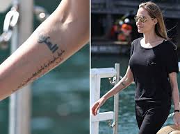 Have picked out a few and looked at the angelina jolie attended the dumbo premiere in los angeles in early march wearing a stunning white chiffon. Angelina Jolie Tattoo Actress Shows Off New Addition To Her Collection Mirror Online
