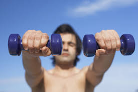 Hold the dumbbells across the thighs horizontally, palms facing back toward the thighs. How To Do Dumbbell Front Raises